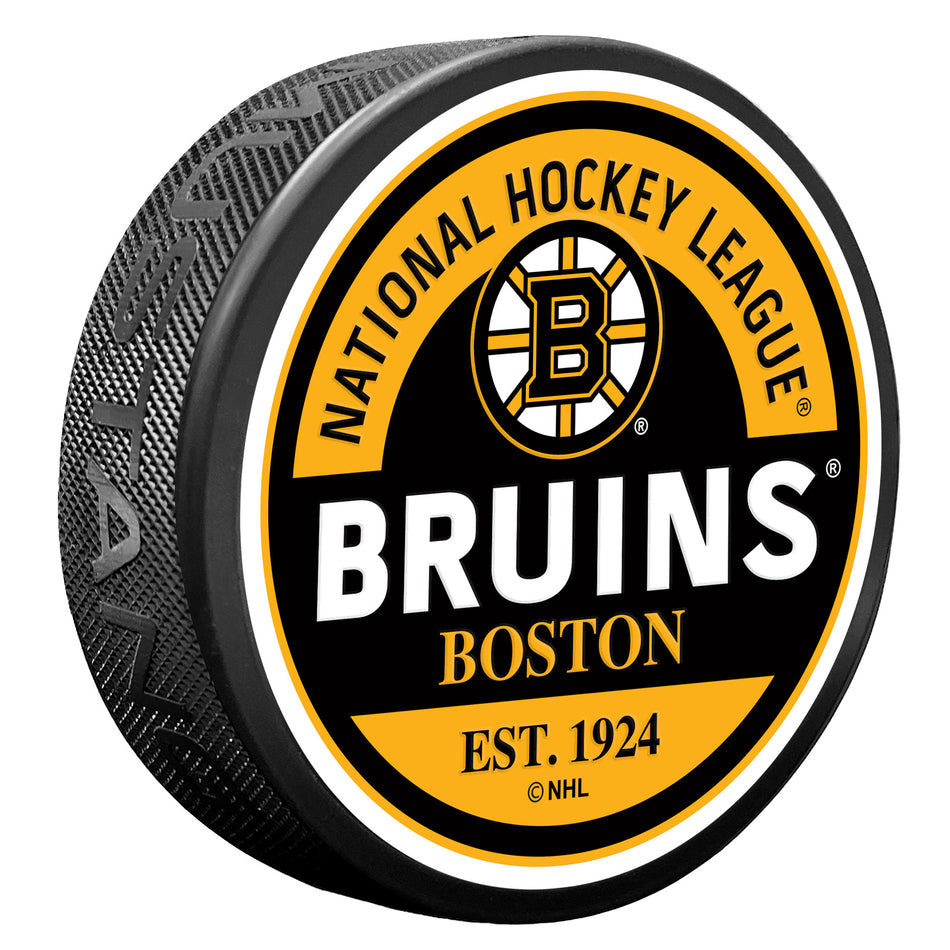 Levně Puk Boston Bruins NHL Block Textured Puck