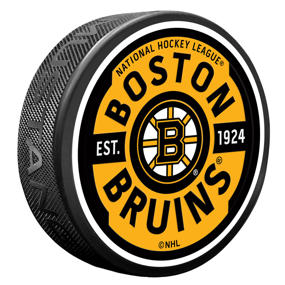 Levně Puk Boston Bruins NHL Gear Textured Puck