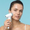 nu skin ageloc lumispa io face cleansing beauty device usage woman blue background image