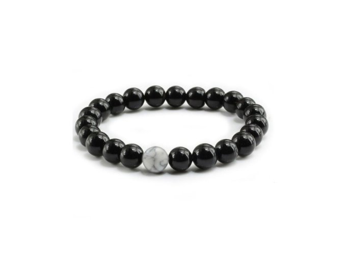 Náramek Black Magnezit Elastic: Průžný náramek s černými magnezitovými korálky, který představuje sílu a odolnost.