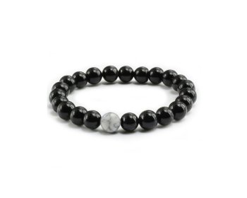 Náramek Black Magnezit Elastic: Průžný náramek s černými magnezitovými korálky, který představuje sílu a odolnost.