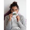 mockup of a woman in bed drinking from a silver rim mug 30833