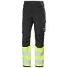 Reflexní kalhoty Helly Hansen ALNA 4X HH CONNECT HI-VIS CLASS 1 - ŽLUTÁ/EBONY 7/8
