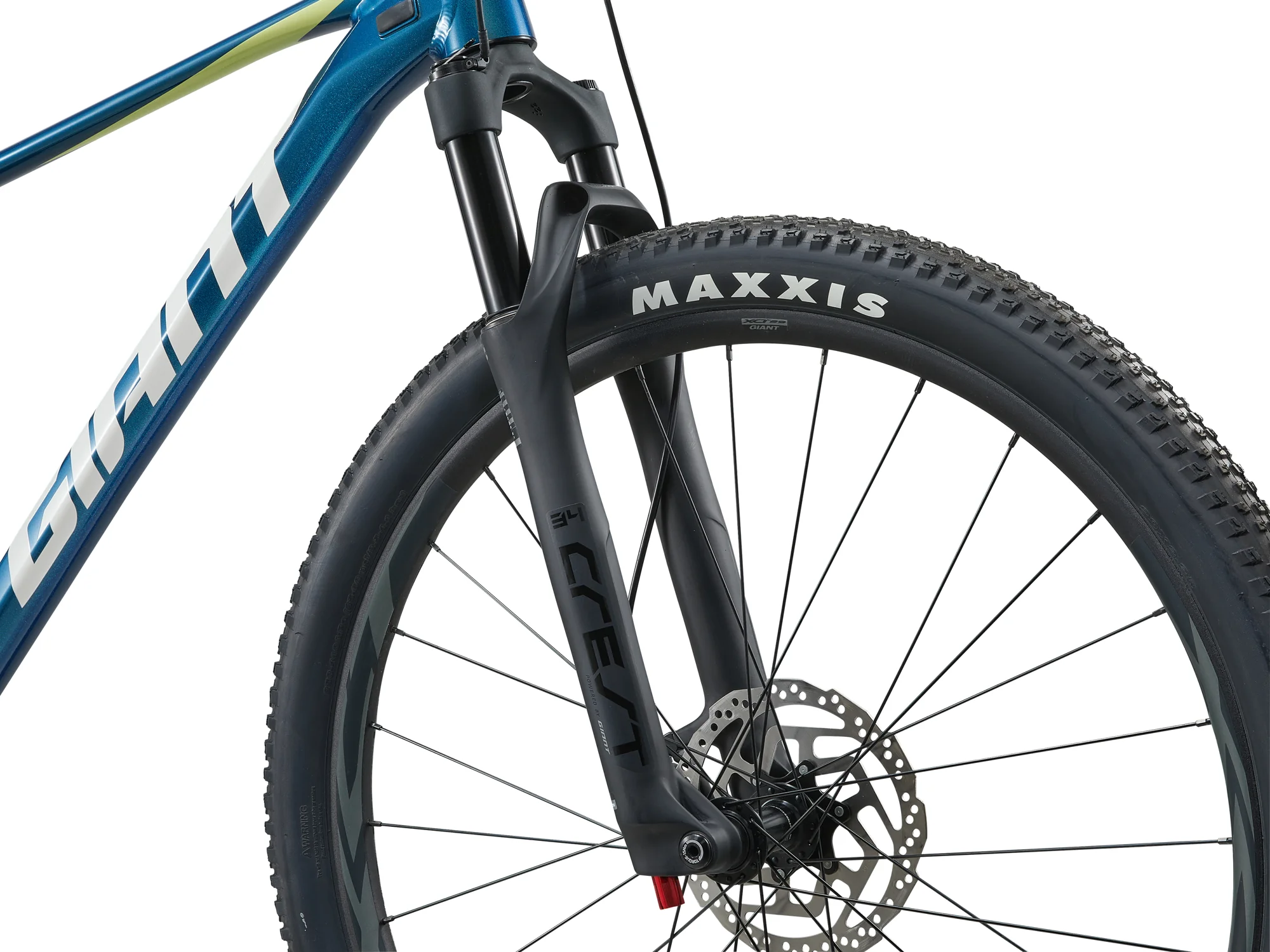 Odpružená vidlice Giant Crest s kotoučovou brzdou a plášť Maxxis na kole Giant XTC SLR 29