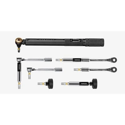 Momentový klíč Topeak TORQ Stick PRO 4–20 Nm vedle ráčen a držáků bitů