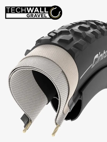 Řez pláštěm Pirelli Cinturato Gravel: kostra TechWALL Gravel s ochrannou vrstvou od patky k patce