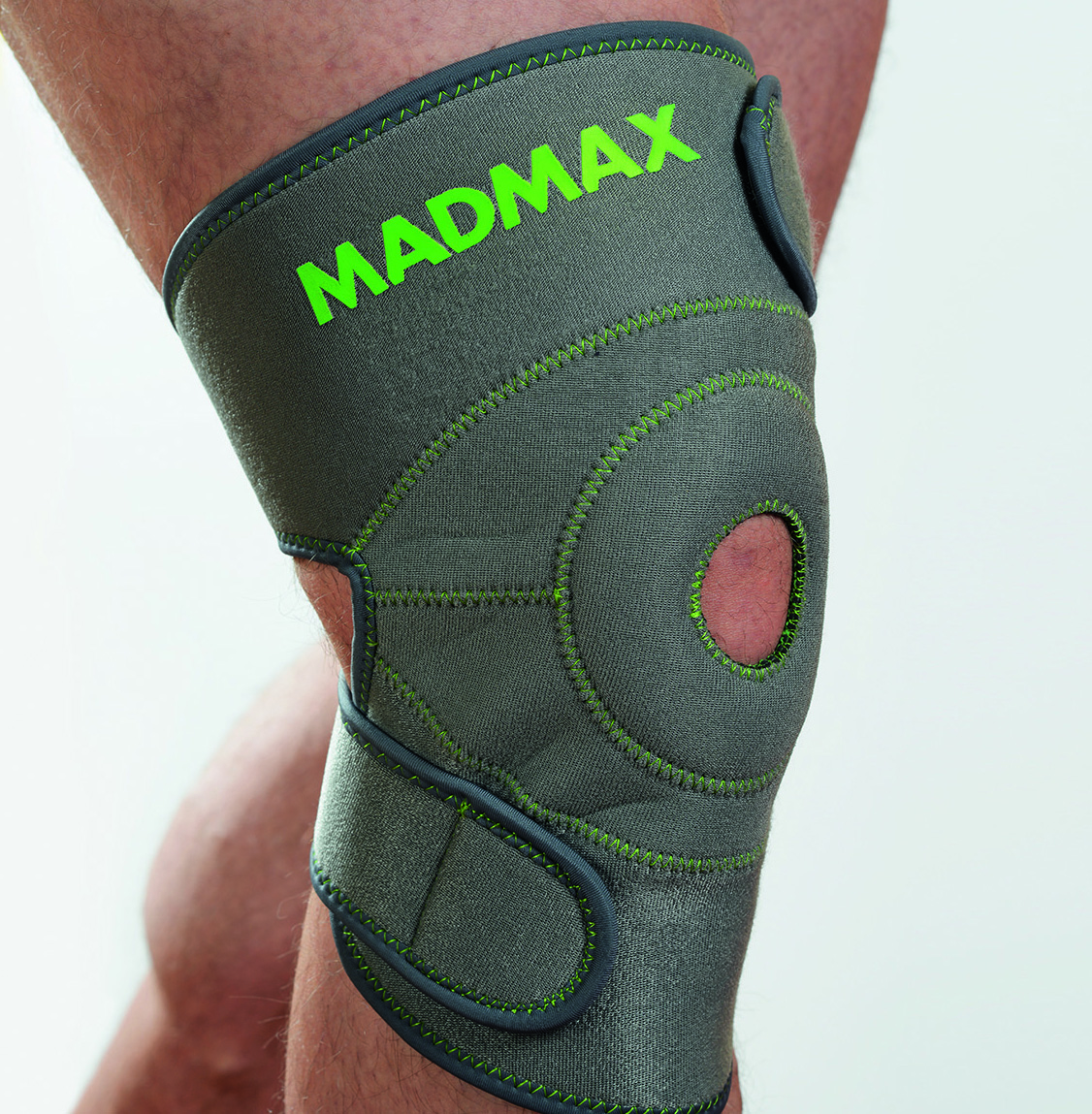 MADMAX Zahoprenová bandáž kolen universal