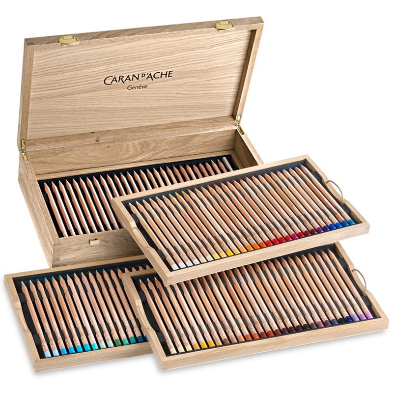 CARAN D'ACHE Pigmentové pastelky Luminance CARAN D'ACHE, 112ks + příslušenství v dřevěné kazetě