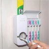 Dávkovač zubní pasty a držák na zubní kartáčky