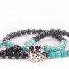 401tao yoga mala wickel armband tuerkis und schwarzer achat mit om anhaenger close up