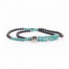 401tao yoga mala wickel armband tuerkis und schwarzer achat mit om anhaenger liegend
