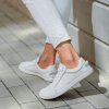 white barefoot sneakers