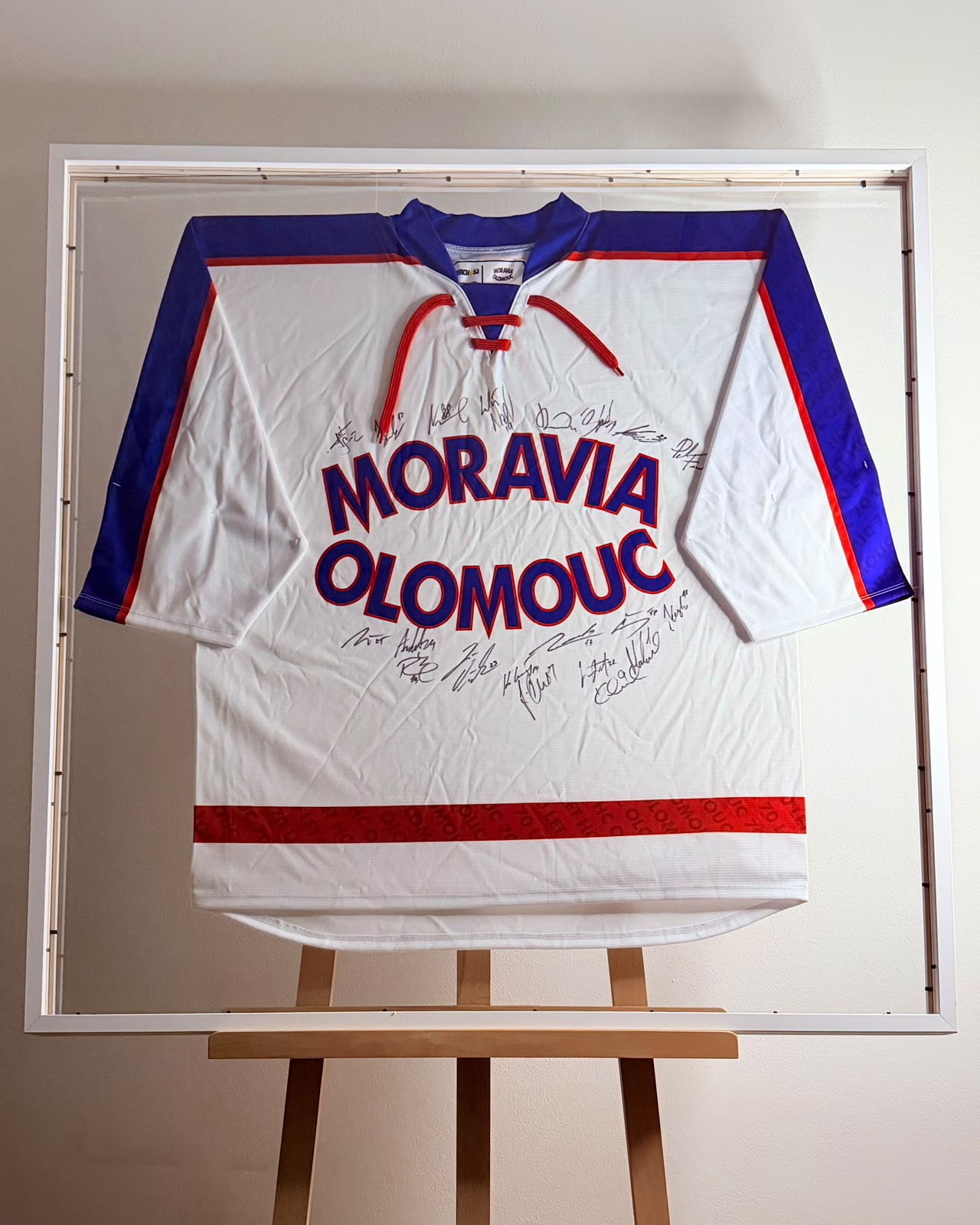 Oboustranné rámování — hokejový dres Moravia Olomouc