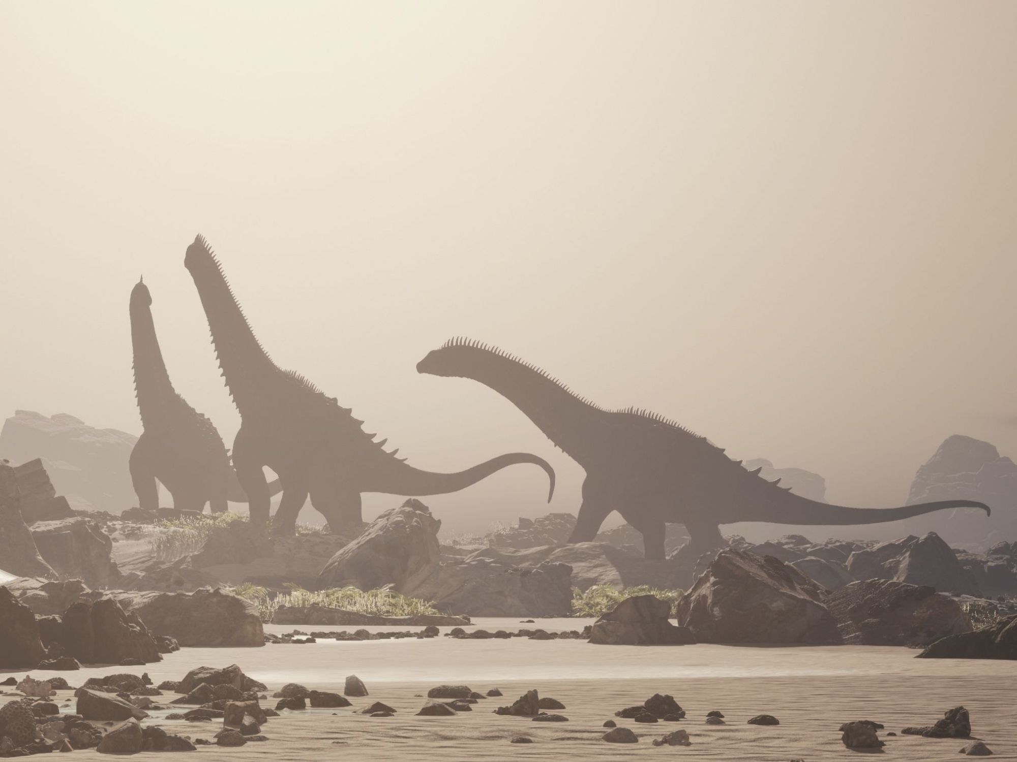 Skupina dinosaurů v pozdní křídě, ilustrační obrázek k zániku dinosaurů a amonitů.