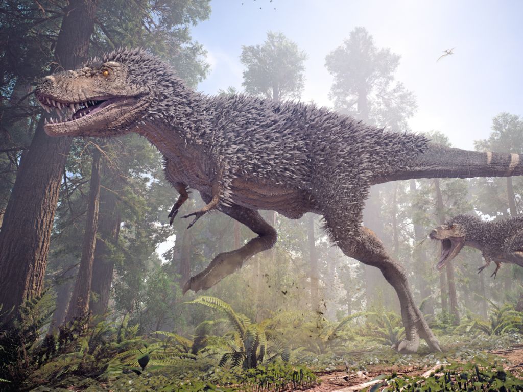Tyranosaurus rex běžící hustým pravěkým pralesem, dožíval se až 30 let.