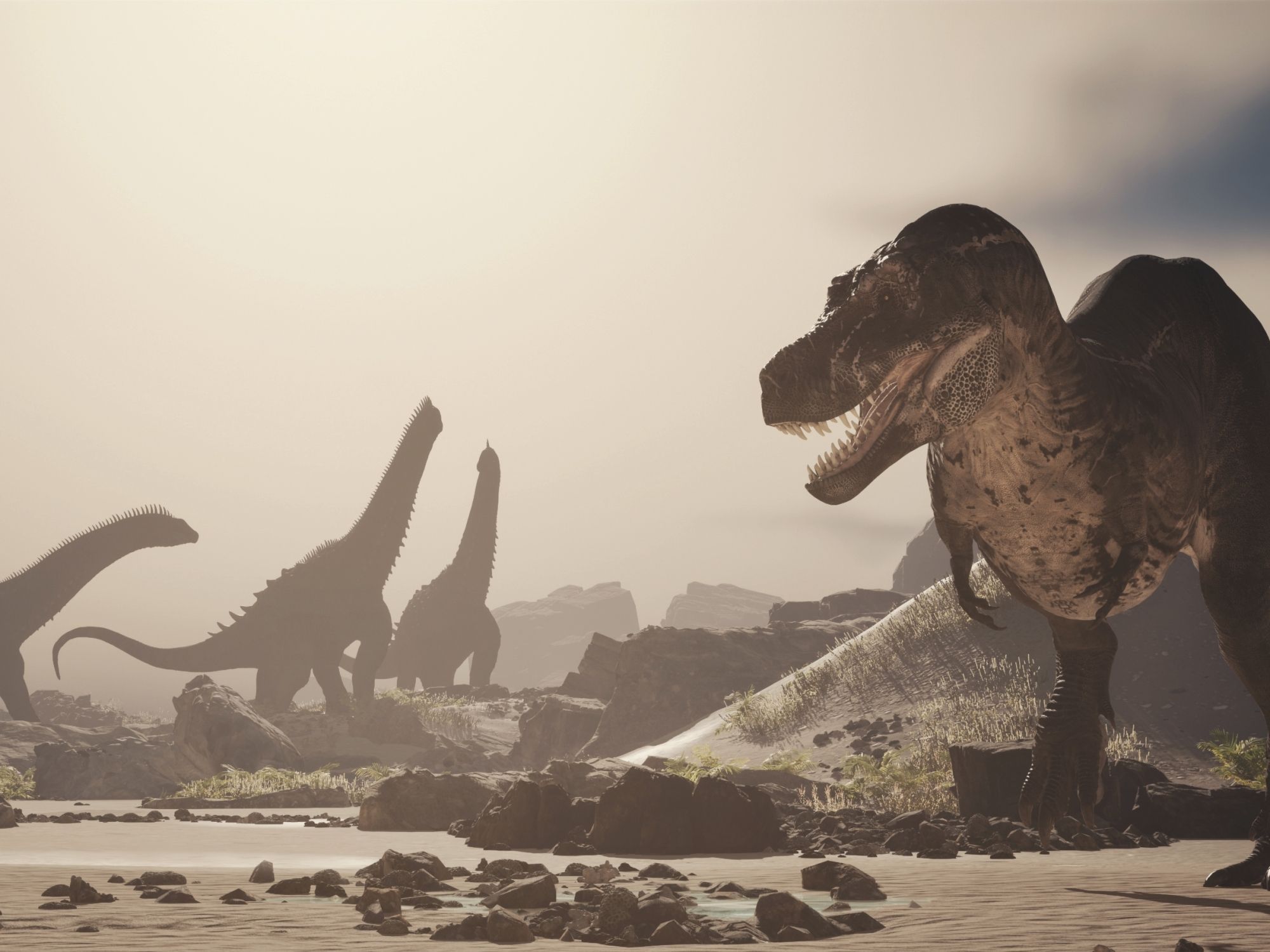 Obří sauropodi a tyranosaurus rex kráčí mlhou pravěké krajiny.