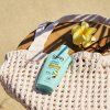 lait après soleil bronzage nature morte couché upr