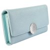 Veľká dámska peňaženka typ listová kabelka so zatváraním na zdobenú patentku blankytná