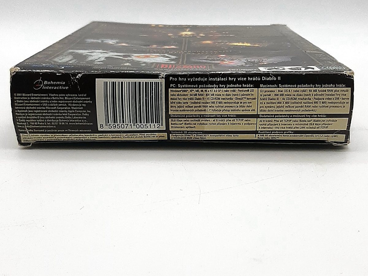 Spodní strana krabice Diablo II: Lord of Destruction s logem Bohemia Interactive, čárovým kódem a systémovými požadavky v češtině