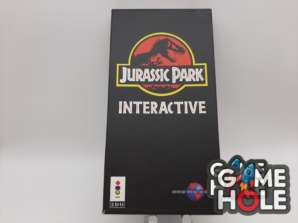 Hra Jurassic Park Interactive pro 3DO ve vysoké černé kartonové krabici s logem Jurského parku