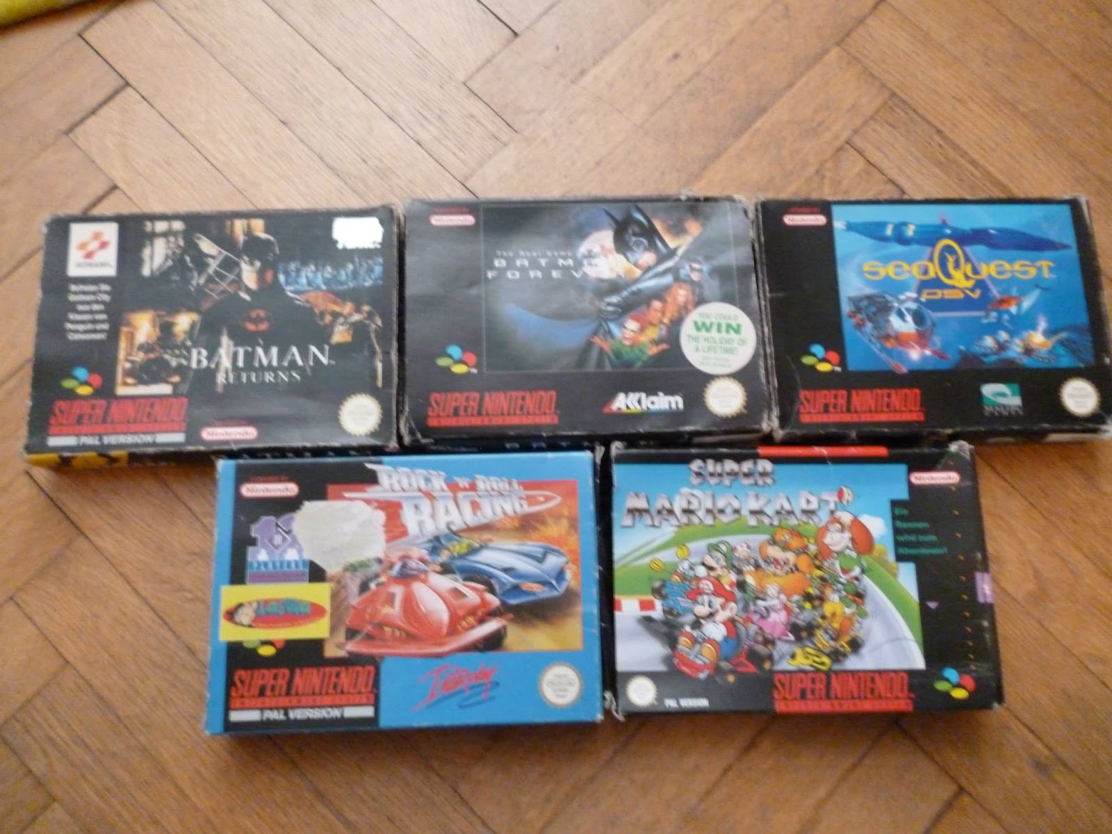 SNES hry v krabičkách — Batman Returns, Super Mario Kart, Rock n Roll Racing