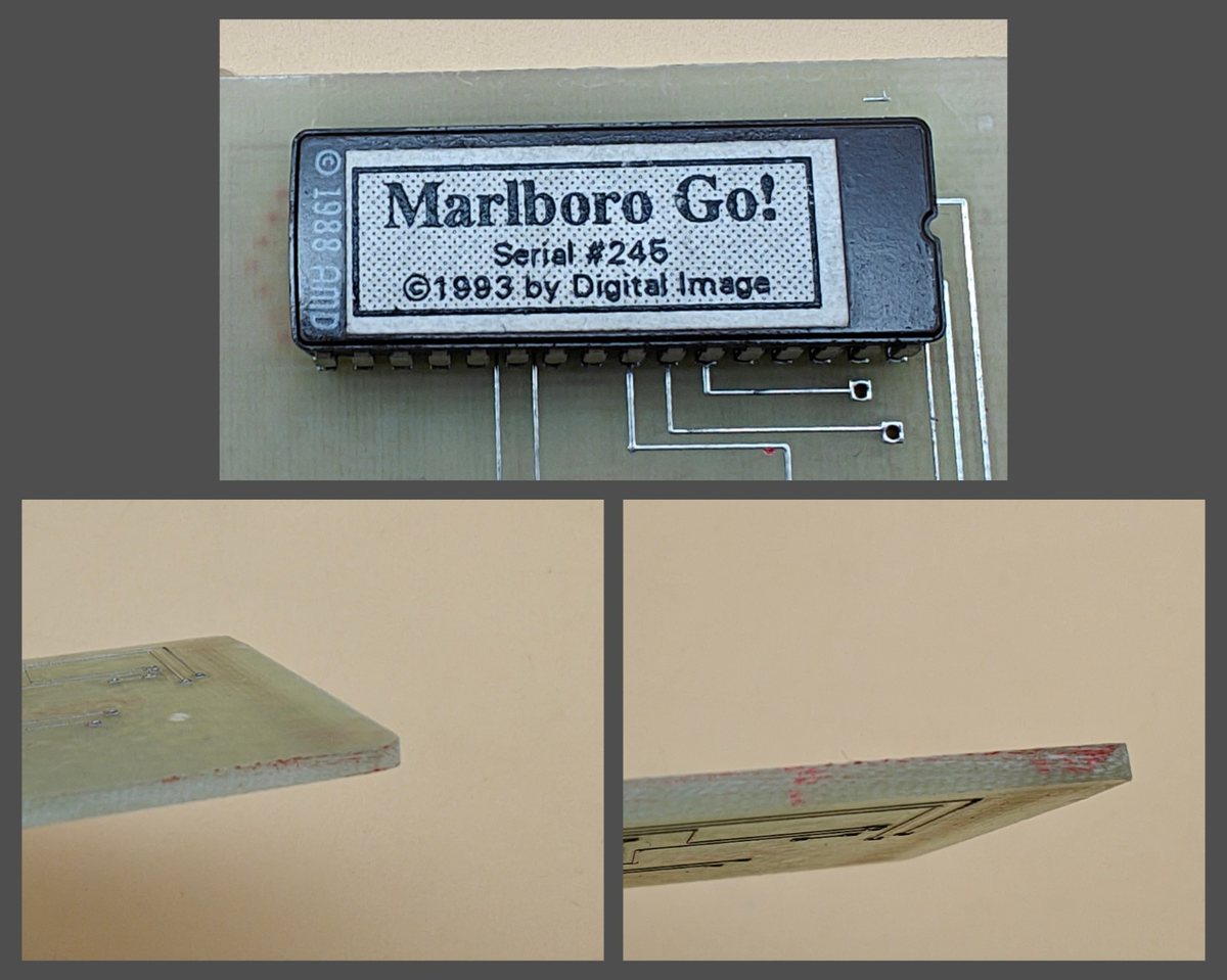 Kazeta Marlboro Go! jako průsvitná ručně leptaná deska s pamětí EPROM a štítkem Marlboro Go! Serial #245 ©1993 by Digital Image