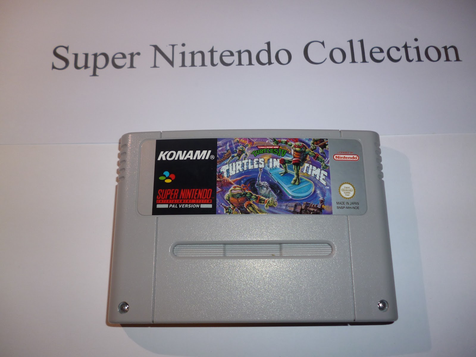 Teenage Mutant Ninja Turtles: Turtles in Time — SNES cartridge ze sbírky