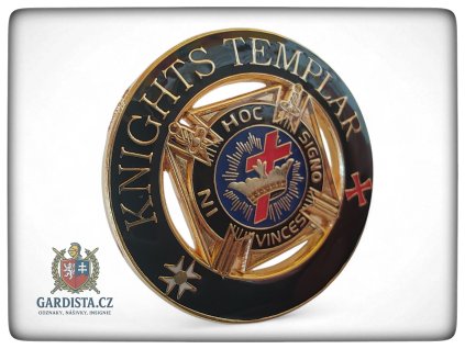 Kulatý odznak s templářskou tématikou.