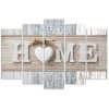 Obraz na plátně Nápis Home na pozadí různých druhů dřeva - 5 dílný