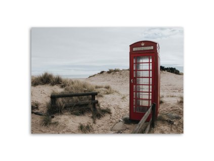 Vászonkép Telefonfülke a tengerparton