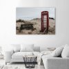 Vászonkép Telefonfülke a tengerparton