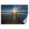 Fototapeta Jazero so starým mólom pri západe slnka