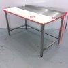 Nerezový stůl s krájecí deskou a zadním lemem 150x80x90