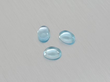 Topaz přírodní ovál 5x7 mm sky modrý kabošon