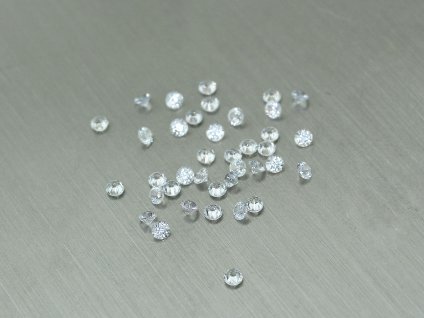 Safír přírodní kulatý 1.8 mm fasetovaný bílý průhledný