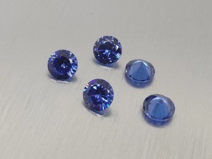 Verre synthétique rond  5-6 mm couleur bleu facetté