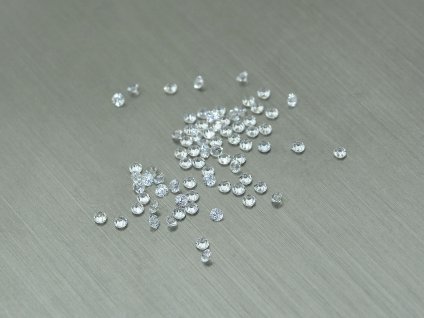 Safír přírodní kulatý 1.3 mm fasetovaný bílý průhledný