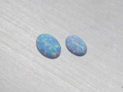 7863 opal synthetisches oval 4x6 5x7mm cabochon hellblau