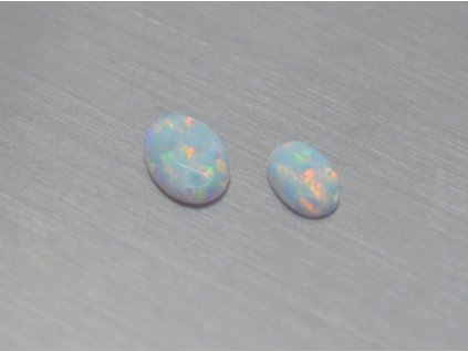 7866 opal synthetisches oval 4x6 5x7mm cabochon wei
