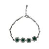 Strieborný náramok so zelenými kryštálmi