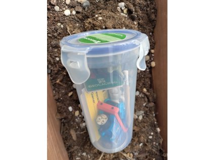 Small Lock-n-lock geocache 430ml with logbook, pencil, sticker, mugglo card. Geocaching shop.