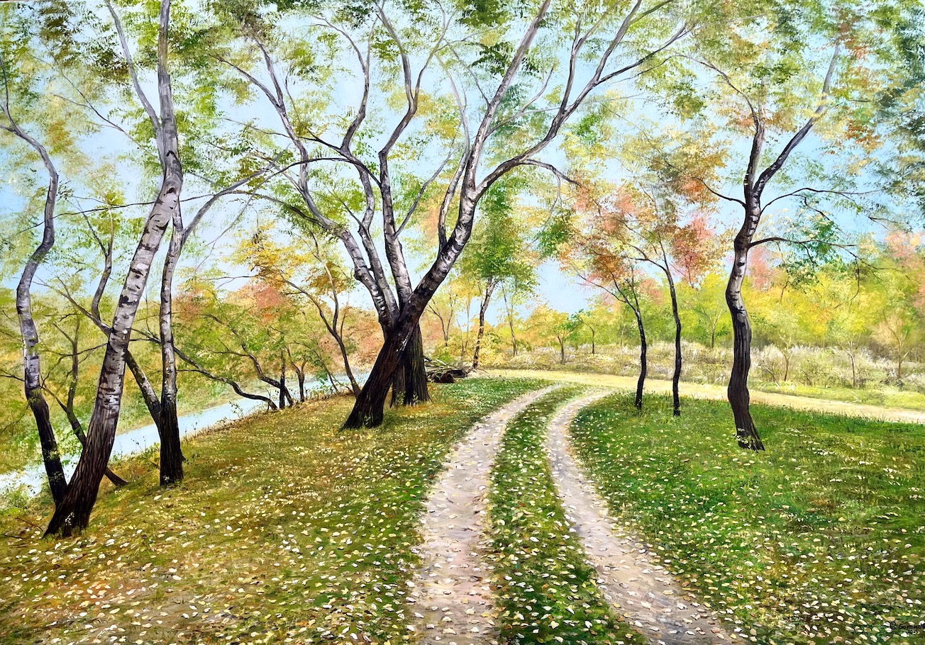 Varázslatos hangulatú őszi földút sárgászöld színvilágú lehullott levelekkel