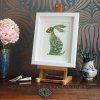 Reprodukce The DM Hare in a meadow