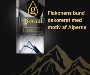 GREY DOLCE Flakonens bund dekoreret med motiv af Alperne