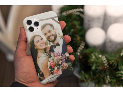 31027 christmas themed mockup of a man holding a phone case 5173 el1 2