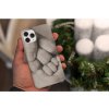 31027 3 christmas themed mockup of a man holding a phone case 5173 el1 5