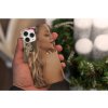 31027 4 christmas themed mockup of a man holding a phone case 5173 el1
