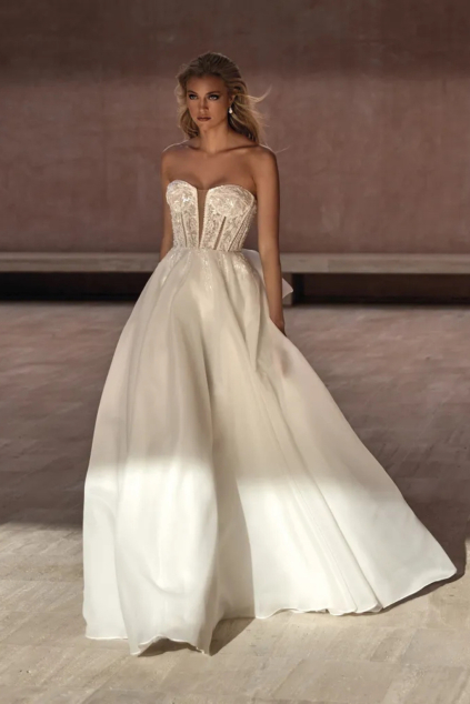 svatebni saty bayon pronovias 2024 strukturocany zivutek organza hladka sukne bez raminek korzet