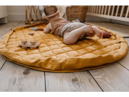 Playandgo organic collection playmat open detail mustard chai tea wooden toys baby playing on mat 2