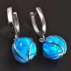 Stříbrné náušnice s modrými opály v klícce č. 1